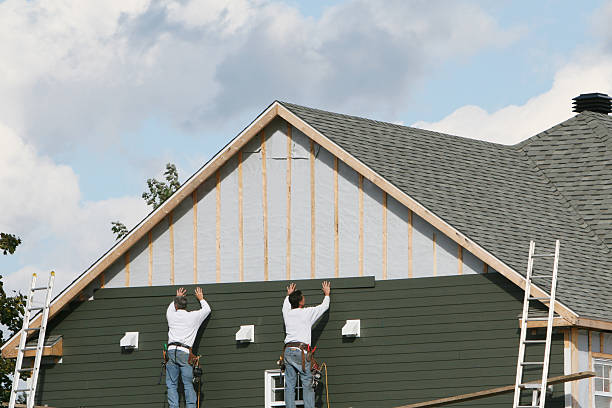 Professional Siding technician working in East Windsor, CT